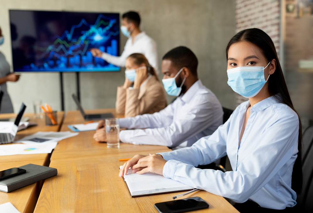 COVID-19 Office Safety. Diverse Business People In Medical Masks